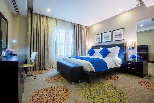 Ένα ή περισσότερα κρεβάτια σε δωμάτιο στο Radisson Blu Plaza Jeddah