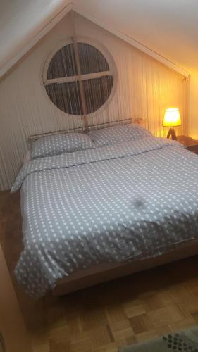 Una cama o camas en una habitación de Apartment Nedic