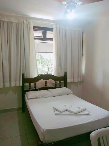 Postel nebo postele na pokoji v ubytování Goias Hotel