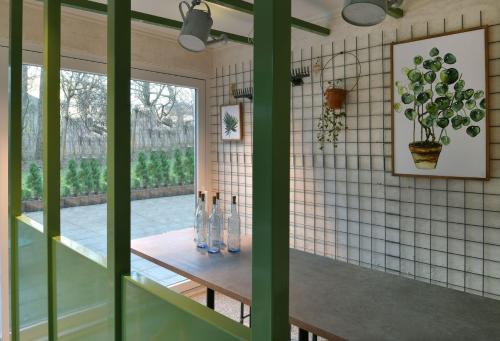 a dining room with a table and a window at Hotel BIRGIT Berlin Mitte in Berlin
