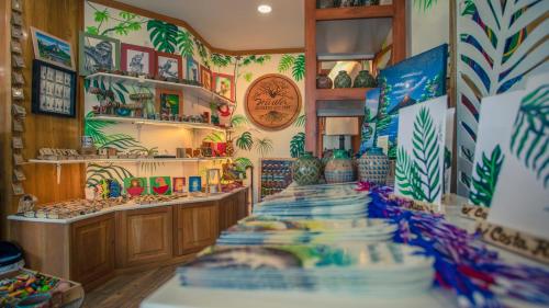 a room with a bunch of vases on display at La Fortuna Downtown Hotel Boutique in Fortuna