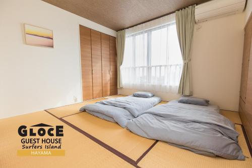 Gallery image of GLOCE 葉山 サーファーズログハウス l HAYAMA Surfers Log house in Hayama