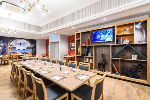 TV o dispositivi per l'intrattenimento presso Holiday Inn Portsmouth by IHG