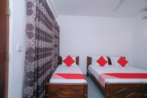 Ένα ή περισσότερα κρεβάτια σε δωμάτιο στο Surf Sea Breeze Apartments