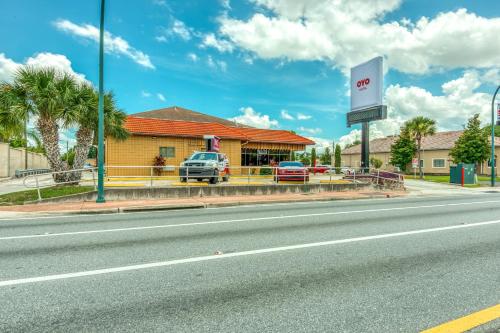 a gas station on the side of a road at Hotel Belair Orlando Near Florida Mall in Orlando