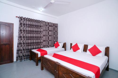 Ένα ή περισσότερα κρεβάτια σε δωμάτιο στο Surf Sea Breeze Apartments