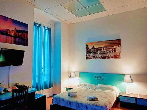 Ένα ή περισσότερα κρεβάτια σε δωμάτιο στο Hotel Youri Il Magnifico
