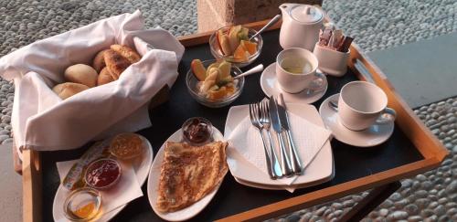 a tray of breakfast food on a table at Saint Artemios Hotel and Oriental Suites in Rhodes Town