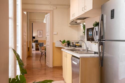 Kuchyňa alebo kuchynka v ubytovaní Family Apartments Angeli