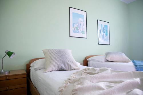 Postel nebo postele na pokoji v ubytování IseoLakeRental - Casa La Rondine