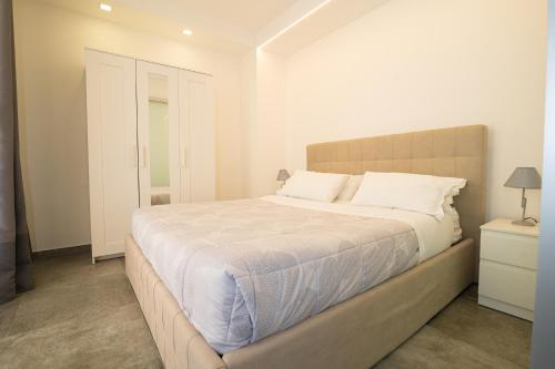 Кровать или кровати в номере Marene Residence
