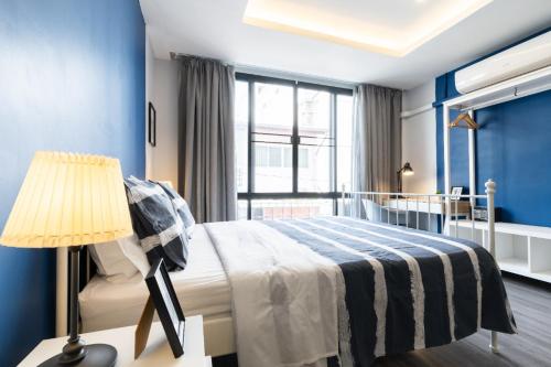 Кровать или кровати в номере Cozy Studio 1 in Sathorn, BTS Saint Louis