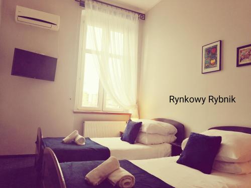 TV a/nebo společenská místnost v ubytování Rynkowy