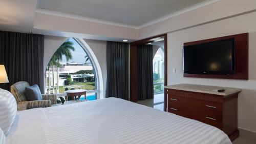 Postel nebo postele na pokoji v ubytování Holiday Inn Tuxtla Gutierrez by IHG