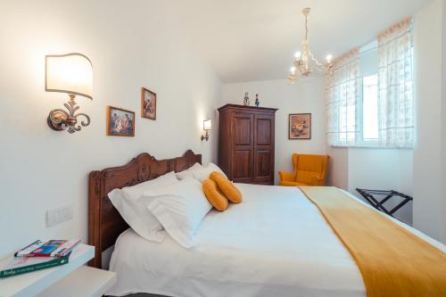 Postel nebo postele na pokoji v ubytování TaoApartments - Casa Antonella