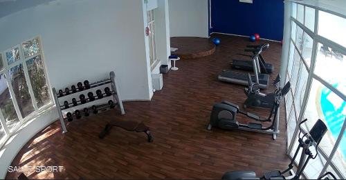 an overhead view of a gym with exercise equipment at Royal Tulip Taj Sultan in Hammamet