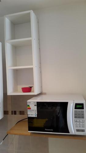 Una cocina o kitchenette en Departamento amoblado de un dormitorio 43m2