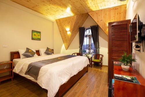 Voodi või voodid majutusasutuse SoNa Resort toas