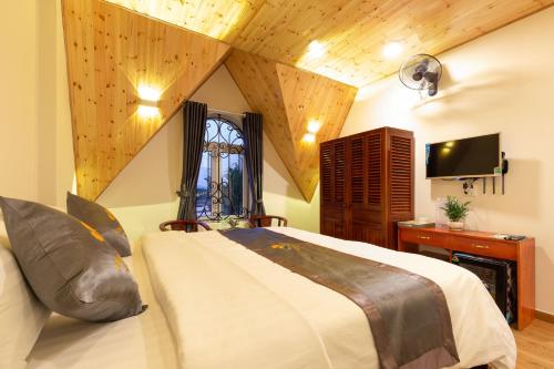Giường trong phòng chung tại SoNa Resort