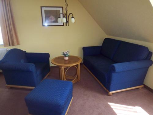 Posezení v ubytování Hammermühle Hotel & Gesundheitsresort