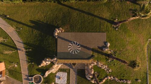 an overhead view of a building with a logo on it at Rodos Palace Hotel in Ixia