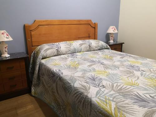 מיטה או מיטות בחדר ב-Apartamentos Chevere Azul