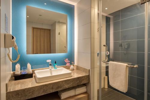 Ένα μπάνιο στο Holiday Inn Express Liaocheng Chiping by IHG