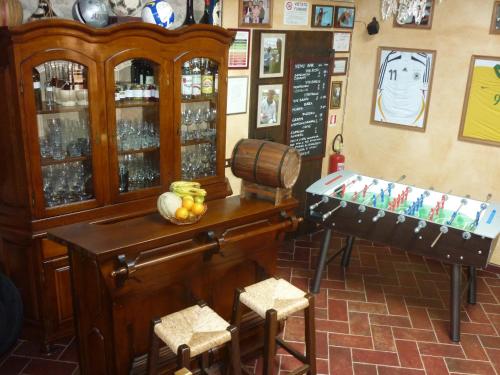 a shop with a table and chairs in a room at San Gennaro Castello in San Gennaro
