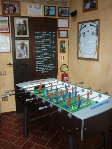 a table with a football game in a classroom at San Gennaro Castello in San Gennaro
