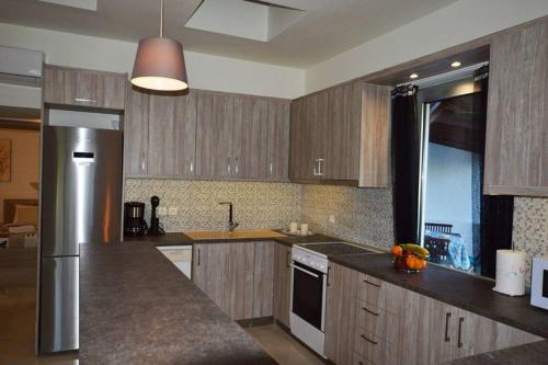 Η κουζίνα ή μικρή κουζίνα στο Renes Paradise Seahome - Afandou Beach, Rhodes