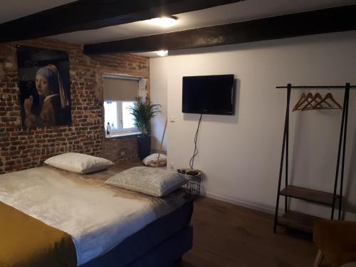Cama o camas de una habitación en B&B Laeve in de Brouwerie