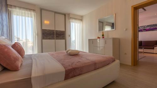 Postel nebo postele na pokoji v ubytování Apartment Split