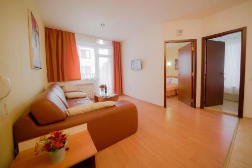 אזור ישיבה ב-Apart Hotel Flora Residence Daisy