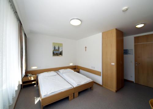 Cama o camas de una habitación en Hotel Kolping Wien Zentral