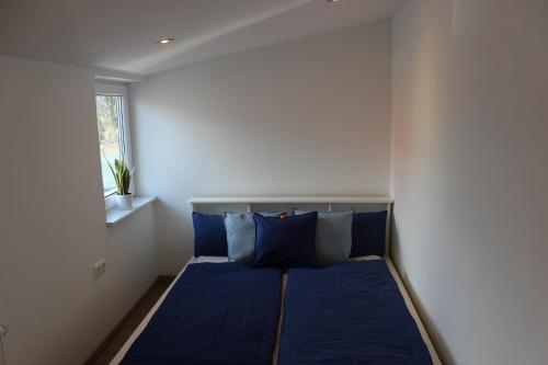 Postel nebo postele na pokoji v ubytování AAR Nordsee Appartement