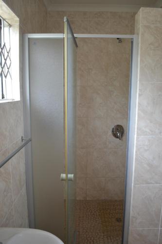 Ένα μπάνιο στο Kamogelo Guest House