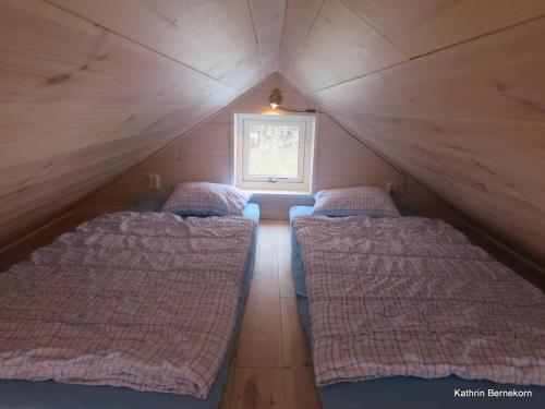 Katil atau katil-katil dalam bilik di Stugan Brantevik