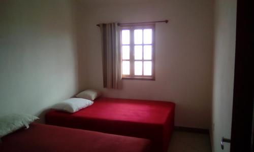 Giường trong phòng chung tại Villa Italia Residencial