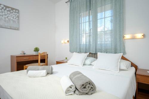 Postel nebo postele na pokoji v ubytování Apartment Nela Kalina