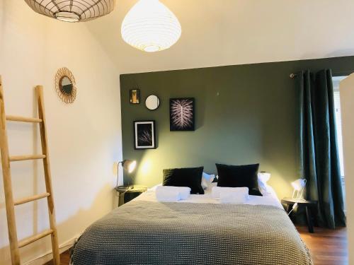 Postel nebo postele na pokoji v ubytování Appartement Casaluna - Casadibastia - Vue mer Citadelle