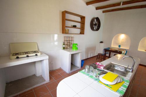 Kuchyň nebo kuchyňský kout v ubytování Aylluwasi Guesthouse