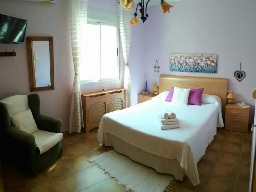 Кровать или кровати в номере Alojamiento El Altet Playa