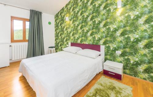 Postel nebo postele na pokoji v ubytování Holiday home in Šušnjevica with swimming pool