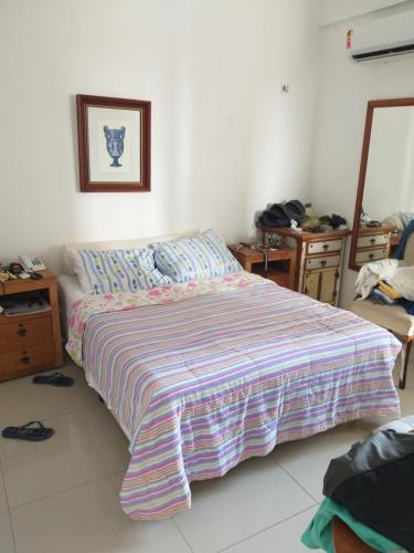 En eller flere senge i et værelse på Flat Beira Mar Golden Fortaleza