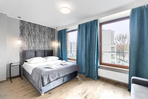 Postel nebo postele na pokoji v ubytování EXCLUSIVE Szczecin Apartment - 2 seperate bedroom 5 star Apartment *****