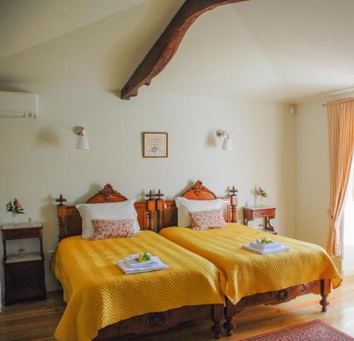 Postel nebo postele na pokoji v ubytování Casa Mindela Farmhouse