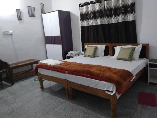 Postel nebo postele na pokoji v ubytování Happy Homestay
