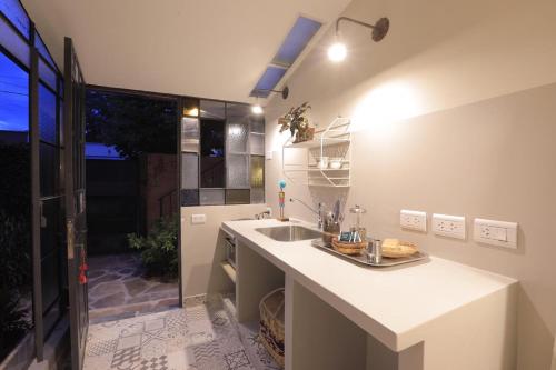a kitchen with a sink and a counter top at Loft para 2 personas in San Salvador de Jujuy