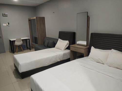 Reno Hotel Ipohにあるベッド