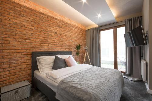 Posteľ alebo postele v izbe v ubytovaní Rakowicka Top Apartaments Superior